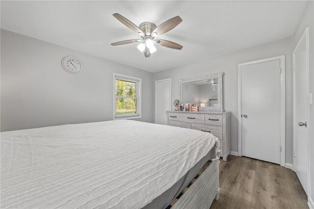 4218 Hideaway Dr, Tucker, GA 30084 - bedroom with ceiling fan and wood finished floors
