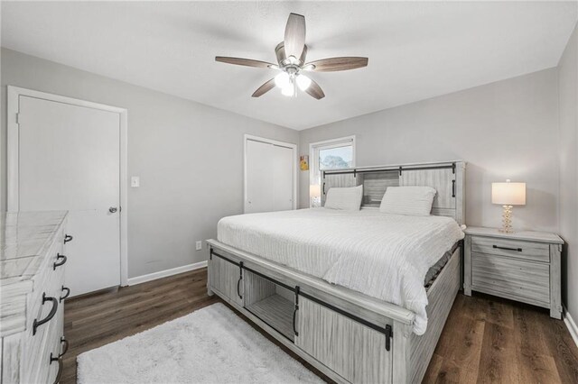 4218 Hideaway Dr, Tucker, GA 30084 - bedroom with dark wood-type flooring, baseboards, and ceiling fan