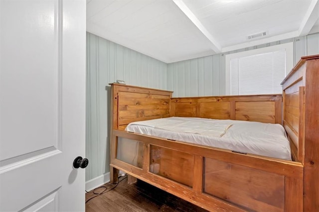 bedroom featuring dark hardwood / wood-style floors