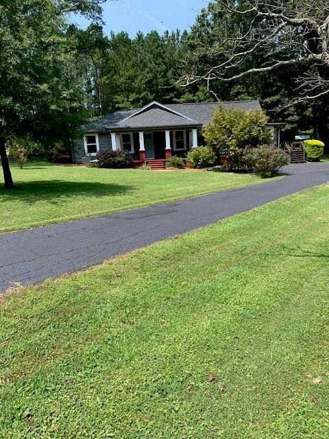 view of front of home with a front lawn