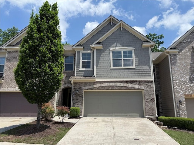 1632 Lenox Overlook Rd NE, Brookhaven, GA 30329 - craftsman-style home featuring concrete driveway, a garage, and brick siding