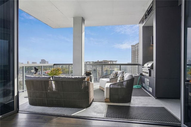 balcony featuring grilling area and an outdoor living space