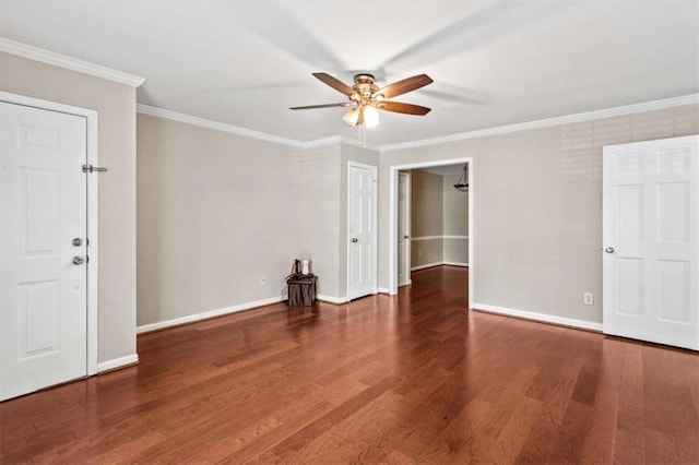 unfurnished room with ceiling fan, wood finished floors, ornamental molding, and baseboards