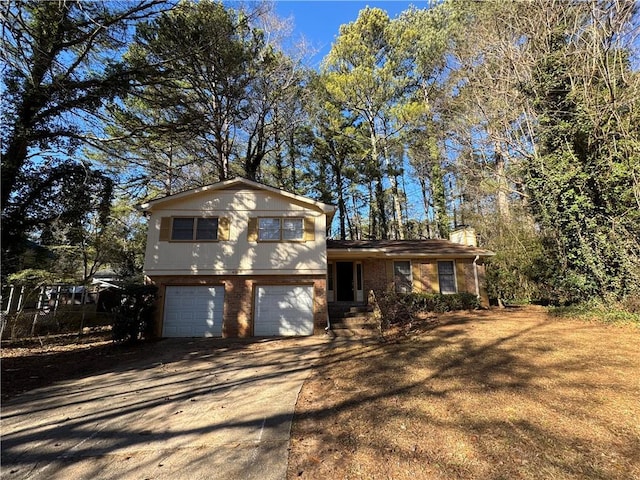 view of front of property with a garage