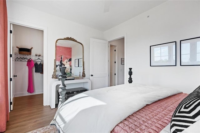 989 Bibbs Cir NW Unit 25, Atlanta, GA 30318 - bedroom with wood finished floors and ceiling fan