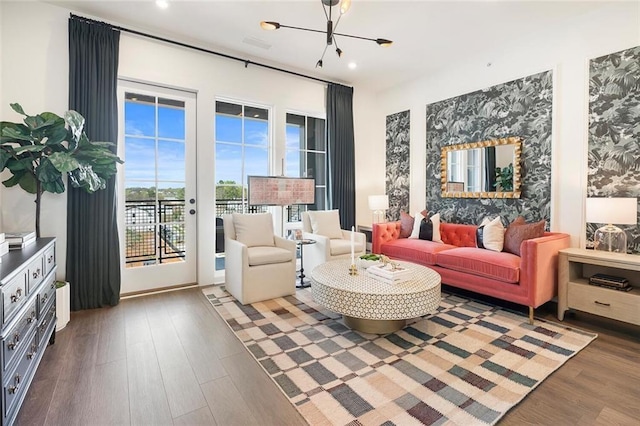 989 Bibbs Cir NW Unit 25, Atlanta, GA 30318 - living room featuring wood finished floors, a chandelier, and recessed lighting