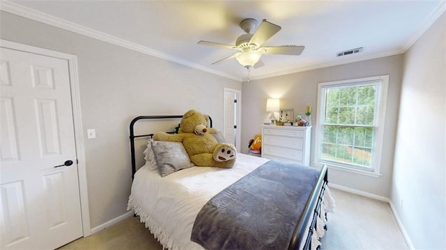 bedroom with baseboards, light colored carpet, ornamental molding, and ceiling fan