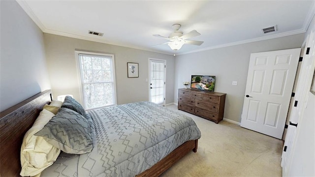 bedroom featuring ornamental molding, light colored carpet, a ceiling fan, and baseboards