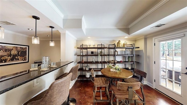 dining area featuring concrete floors, baseboards, recessed lighting, and ornamental molding