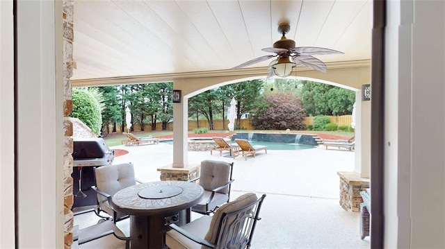 view of patio / terrace with ceiling fan and a fenced backyard