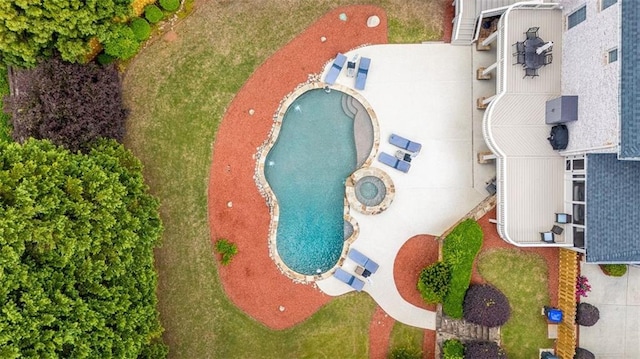 drone / aerial view of a pool