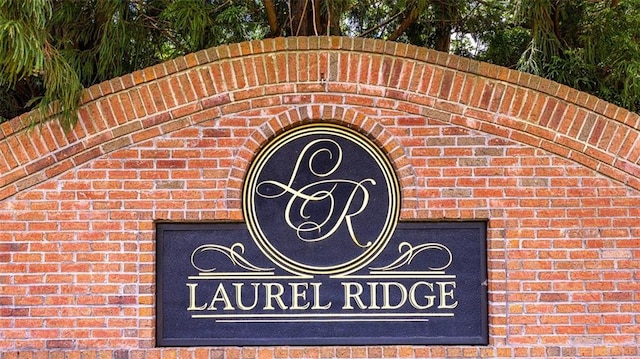 view of community sign