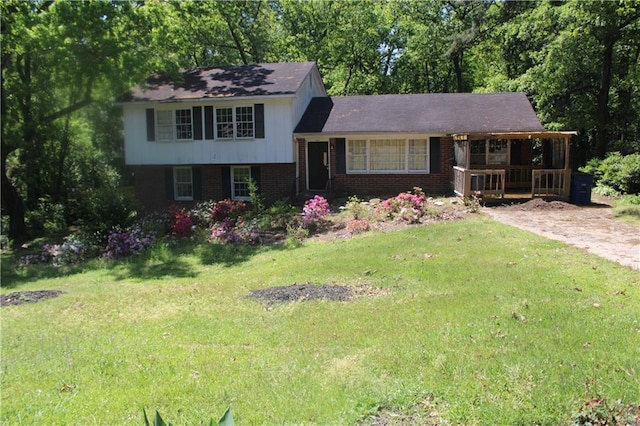 2916 Southshore Dr, Macon, GA 31204 - split level home with brick siding and a front lawn