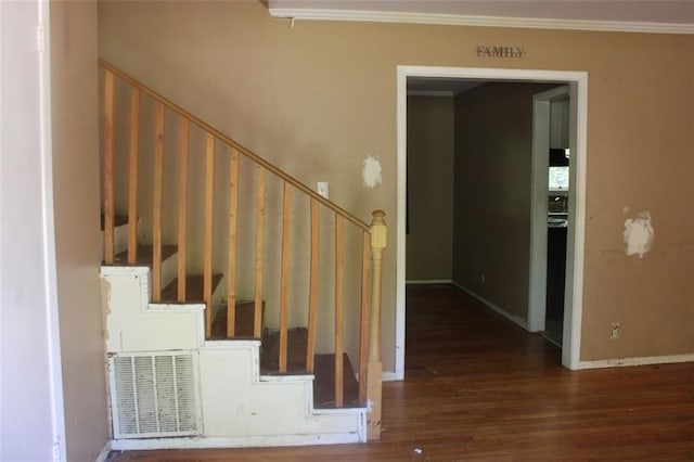 2916 Southshore Dr, Macon, GA 31204 - stairs featuring crown molding, wood finished floors, and baseboards