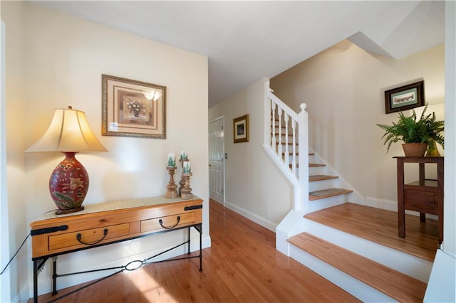 entrance foyer with light hardwood / wood-style flooring