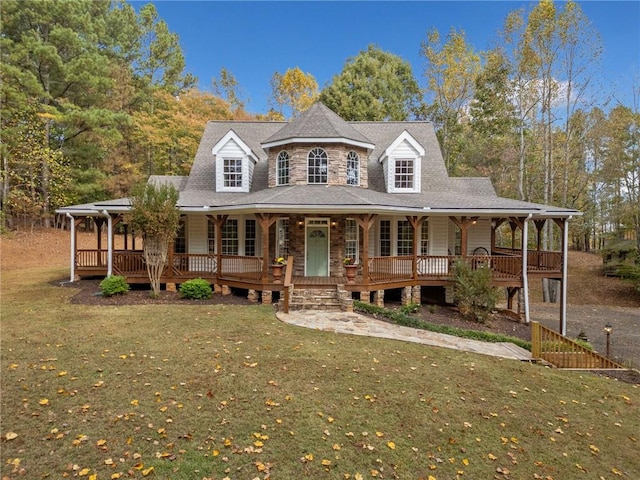 view of front of property featuring a porch and a front lawn