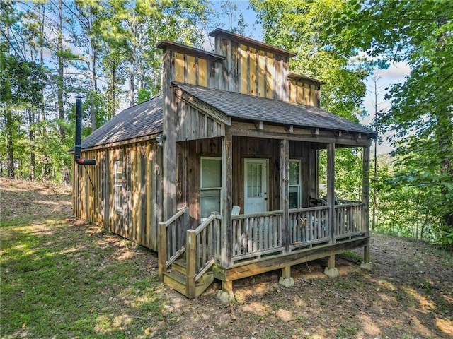 view of outdoor structure featuring a porch