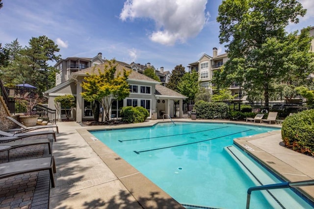 view of swimming pool featuring a patio