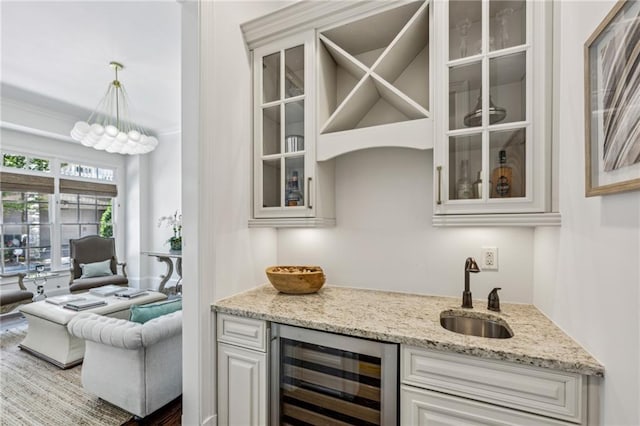 3113 Lenox Rd NE Unit 6, Atlanta, GA 30324 - indoor wet bar with beverage cooler and hanging light fixtures