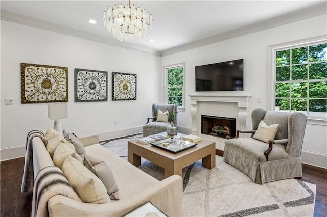 3113 Lenox Rd NE Unit 6, Atlanta, GA 30324 - living area featuring ornamental molding, a chandelier, a fireplace, dark wood-style flooring, and baseboards