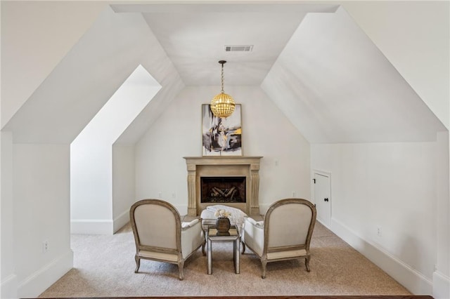3113 Lenox Rd NE Unit 6, Atlanta, GA 30324 - living area featuring carpet flooring, vaulted ceiling, baseboards, and a fireplace