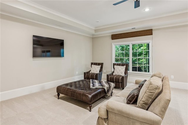 3113 Lenox Rd NE Unit 6, Atlanta, GA 30324 - carpeted living room featuring crown molding, a ceiling fan, baseboards, and recessed lighting