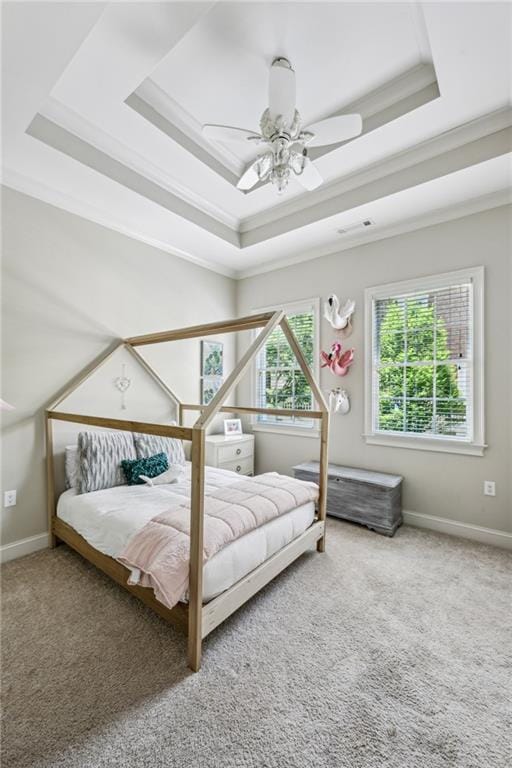 3113 Lenox Rd NE Unit 6, Atlanta, GA 30324 - bedroom featuring a tray ceiling, carpet, crown molding, and baseboards
