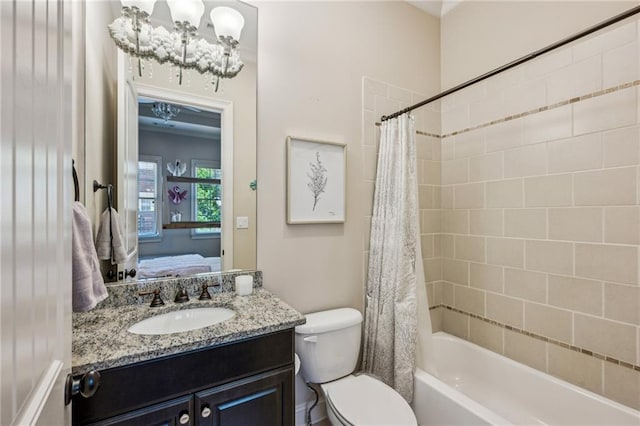3113 Lenox Rd NE Unit 6, Atlanta, GA 30324 - ensuite bathroom featuring toilet, vanity, shower / bath combo with shower curtain, and a chandelier