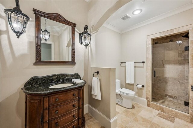 3113 Lenox Rd NE Unit 6, Atlanta, GA 30324 - full bathroom featuring toilet, crown molding, vanity, a shower stall, and baseboards