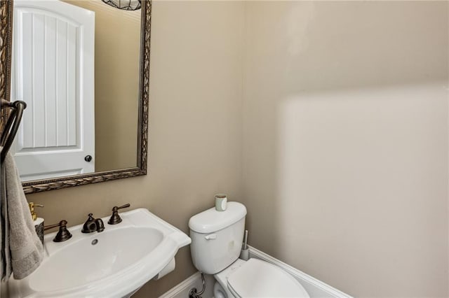 3113 Lenox Rd NE Unit 6, Atlanta, GA 30324 - half bath featuring a sink and toilet