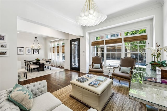 3113 Lenox Rd NE Unit 6, Atlanta, GA 30324 - living room with a chandelier, crown molding, wood finished floors, and baseboards