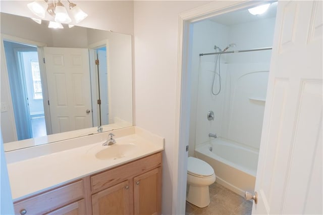 full bathroom with bathing tub / shower combination, tile patterned floors, vanity, and toilet