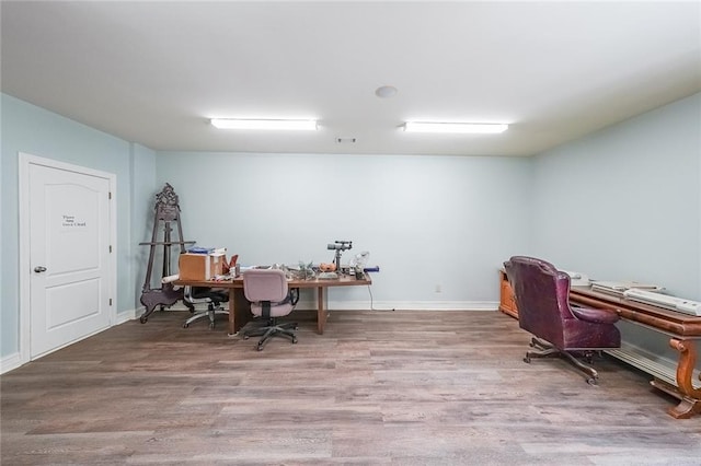 home office featuring hardwood / wood-style floors