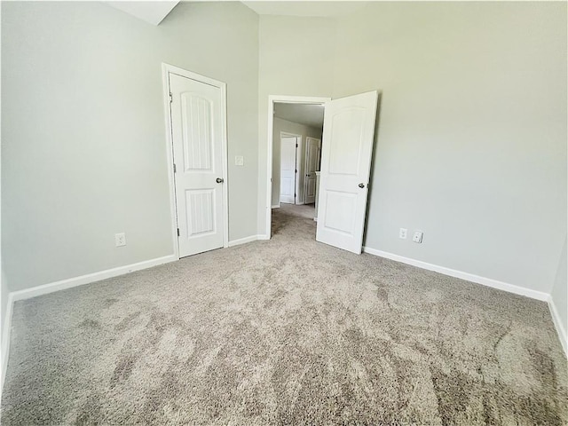 4417 Belcamp Rd, Fairburn, GA 30213 - unfurnished bedroom with carpet flooring and lofted ceiling