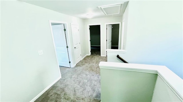 4417 Belcamp Rd, Fairburn, GA 30213 - hallway featuring light carpet, attic access, and an upstairs landing