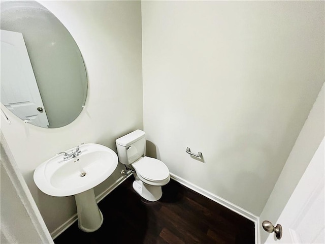 4417 Belcamp Rd, Fairburn, GA 30213 - bathroom featuring baseboards and wood finished floors