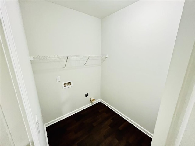 4417 Belcamp Rd, Fairburn, GA 30213 - laundry room featuring dark wood-style flooring, hookup for a washing machine, and electric dryer hookup