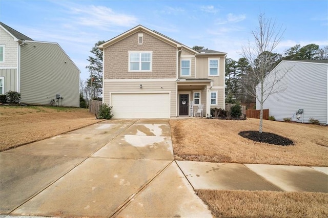 view of front of house with driveway and a garage