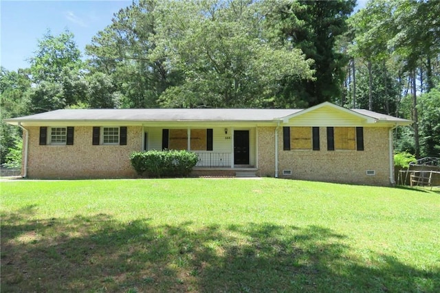 single story home featuring a front yard and covered porch