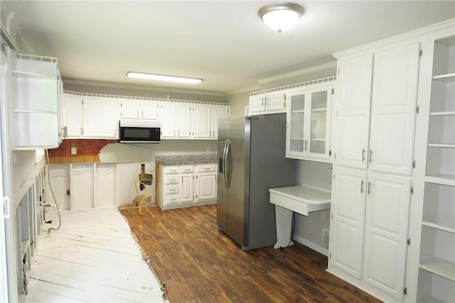 kitchen featuring tasteful backsplash, dark hardwood / wood-style floors, white cabinets, stainless steel refrigerator with ice dispenser, and ornamental molding