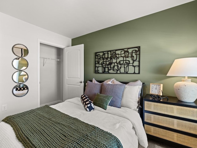 carpeted bedroom featuring a closet