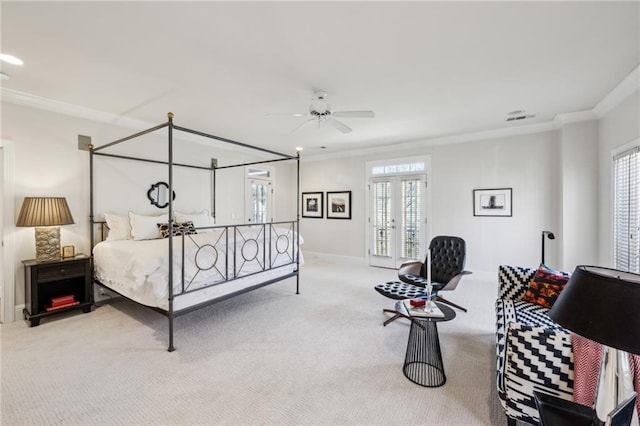 carpeted bedroom with visible vents, ornamental molding, access to outside, french doors, and baseboards