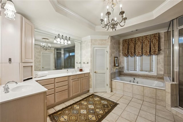 full bathroom with crown molding, a raised ceiling, a bath, tile patterned floors, and a chandelier