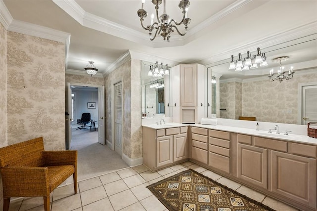 full bath with tile patterned flooring, wallpapered walls, a chandelier, double vanity, and a sink