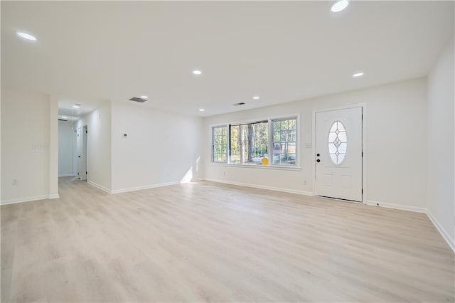 foyer entrance featuring light wood-type flooring