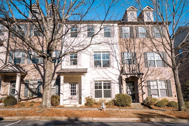 multi unit property featuring brick siding