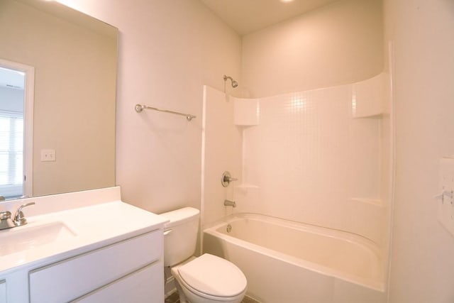 full bathroom with shower / bathing tub combination, toilet, and vanity