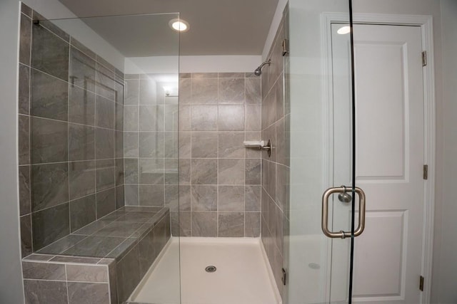 full bathroom featuring a shower stall