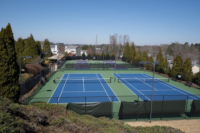 view of sport court with community basketball court and fence