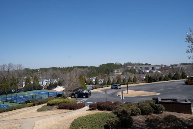 view of street featuring curbs and a residential view